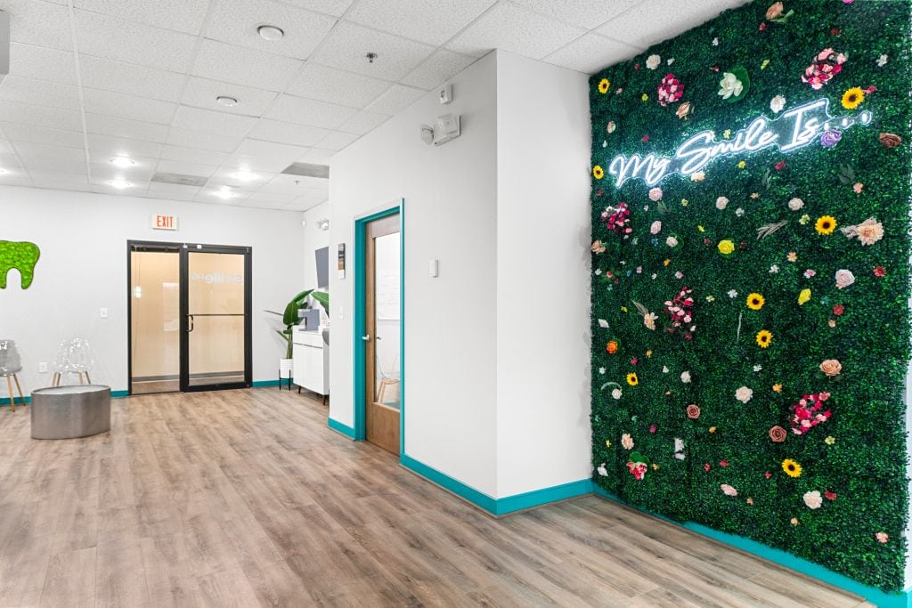 SmileHQ office with floral wall