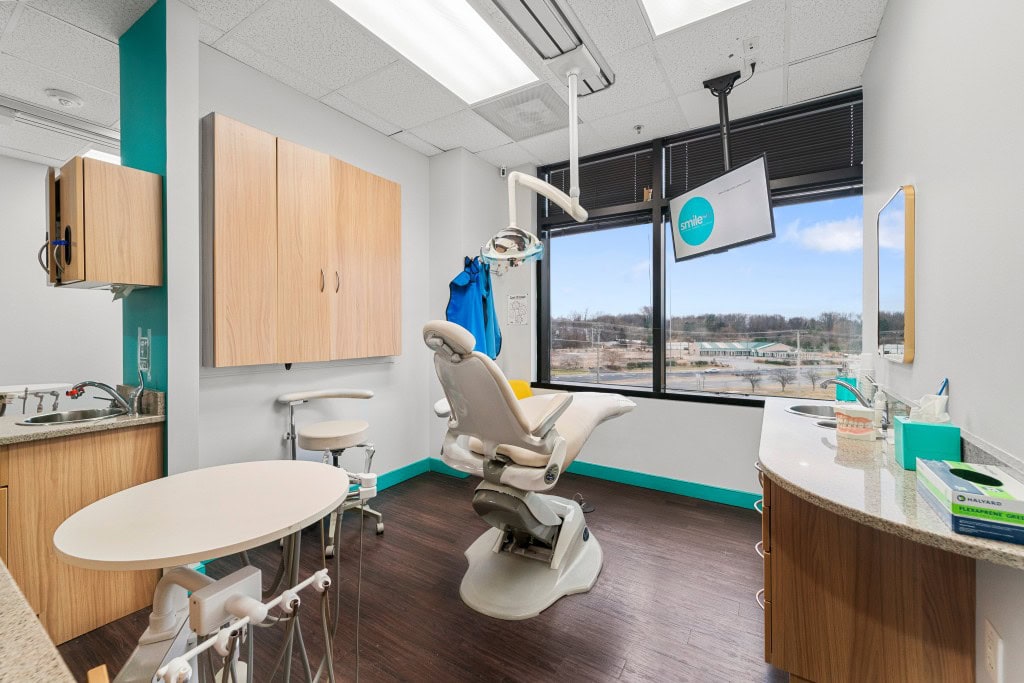 exam room with chair and equipment